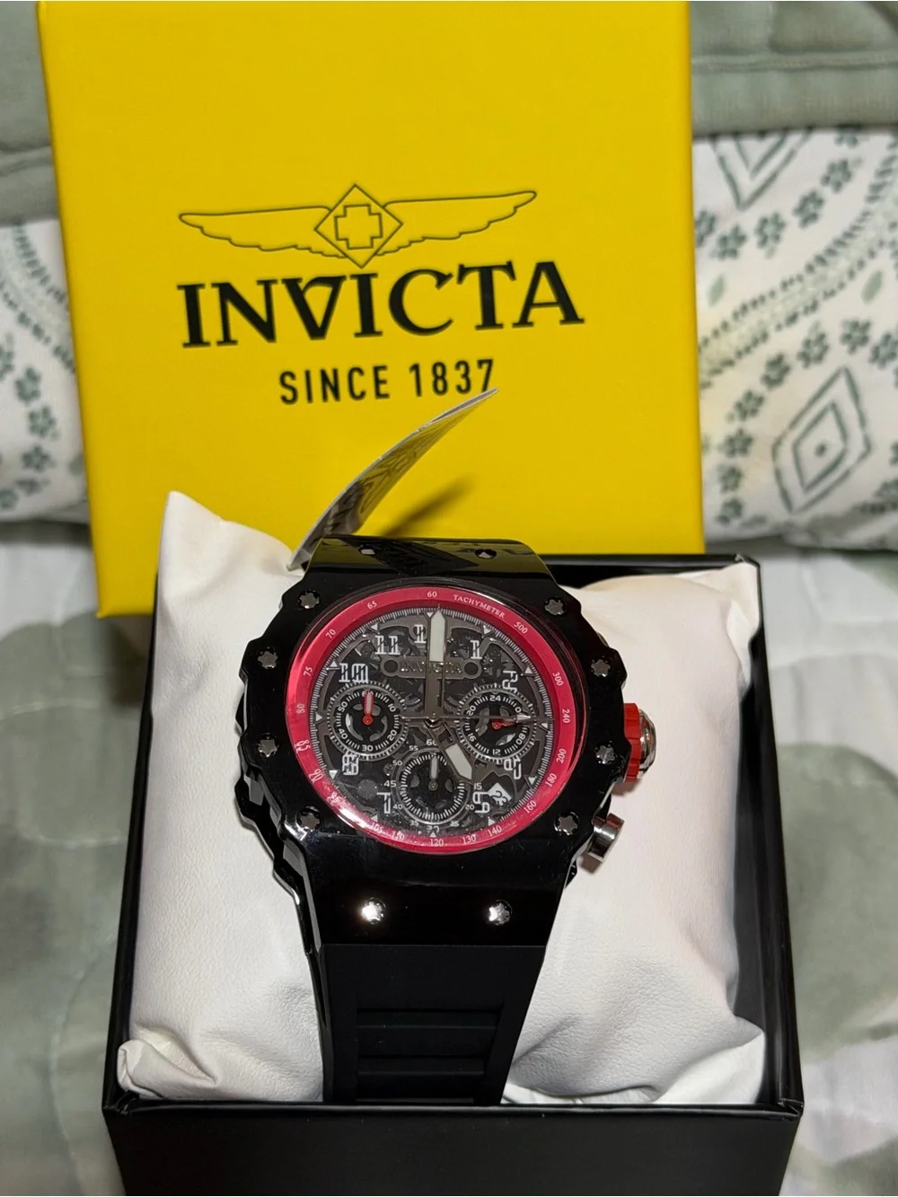 Invicta Racing Black Watch with Red Accents and Skeleton Dial